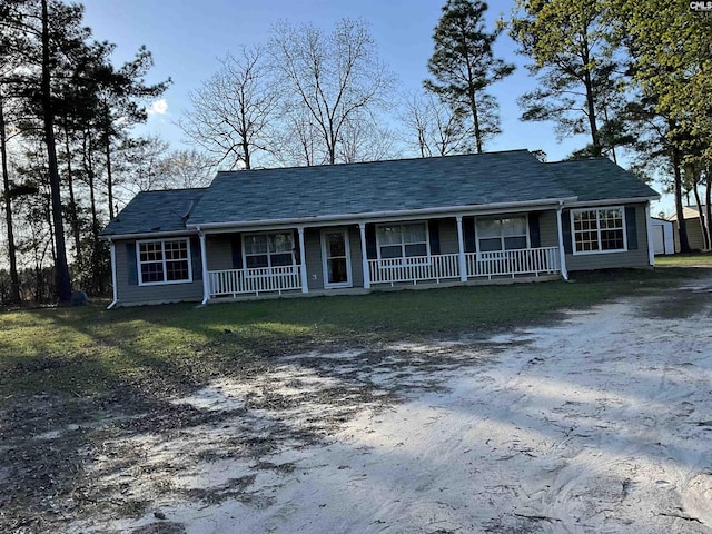 ranch-style house with covered porch