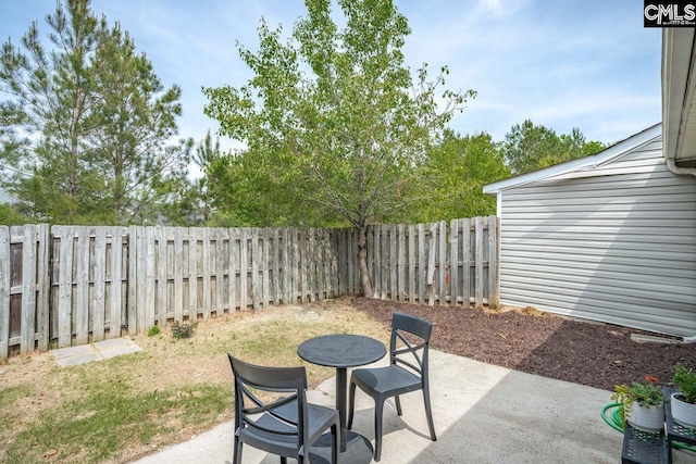 view of patio with a fenced backyard