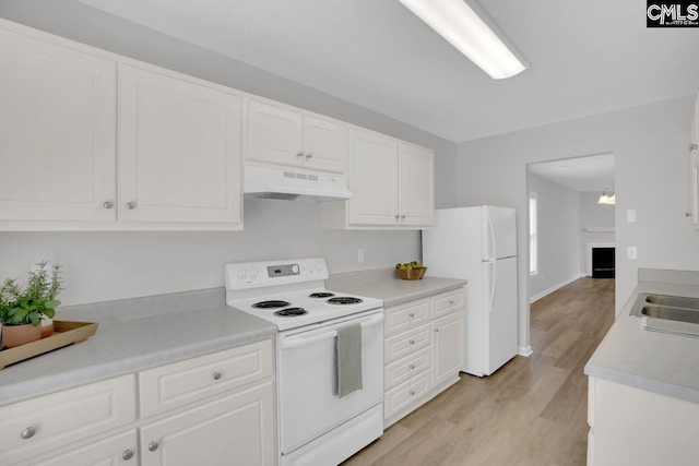 kitchen featuring under cabinet range hood, white appliances, light wood-type flooring, white cabinetry, and light countertops