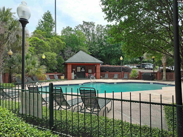 900 Taylor St Unit 304, Columbia, SC 29201 - pool featuring a patio and fence