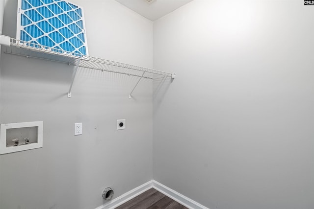 washroom with hookup for a washing machine, laundry area, hookup for an electric dryer, baseboards, and dark wood-type flooring