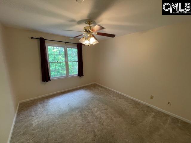 910 Poinsett Pl Unit 6, West Columbia, SC 29169 - empty room featuring baseboards, ceiling fan, and carpet