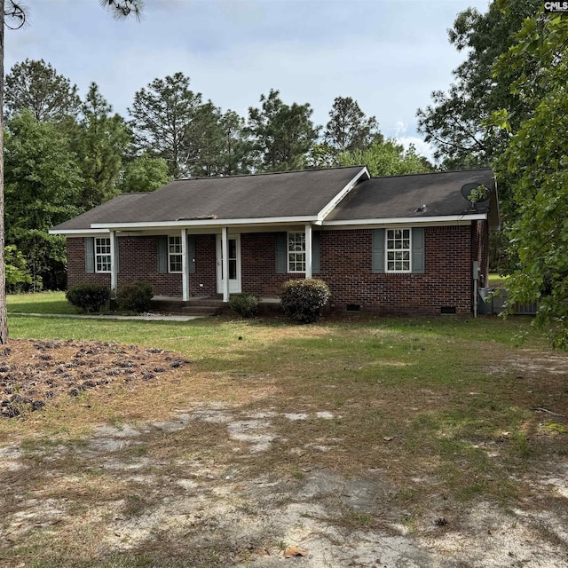 ranch-style house with a porch, brick siding, crawl space, and a front lawn