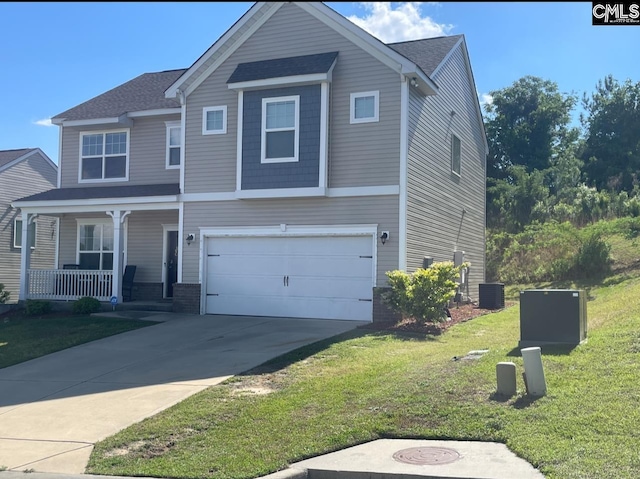traditional home with a porch, driveway, central AC, a front lawn, and an attached garage