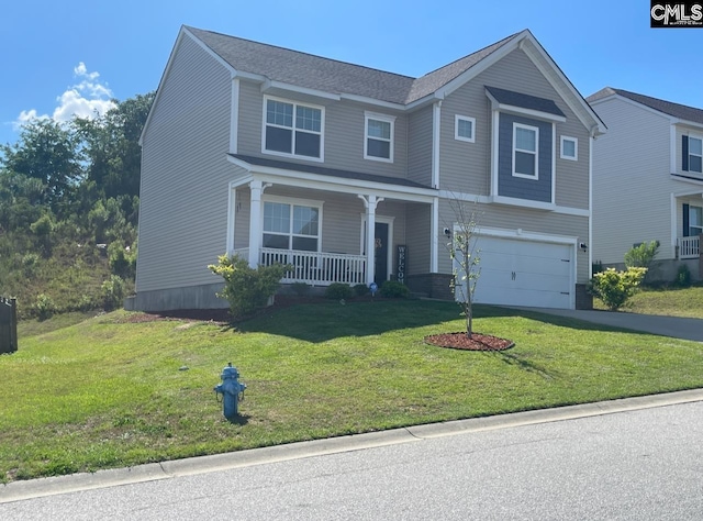 view of front facade featuring a porch, a front yard, driveway, and an attached garage