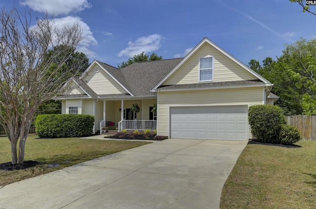 traditional home featuring driveway, a shingled roof, covered porch, fence, and a front lawn