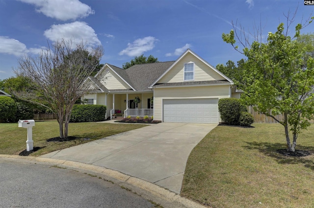 view of front of home with a front lawn, a shingled roof, covered porch, driveway, and fence