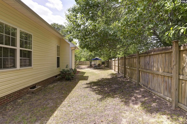view of yard featuring a fenced backyard