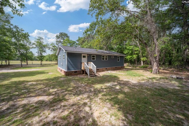 1203 Basil Rd, Swansea, SC 29160 - back of house featuring a yard and crawl space