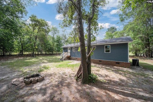 1203 Basil Rd, Swansea, SC 29160 - view of yard featuring an outdoor fire pit