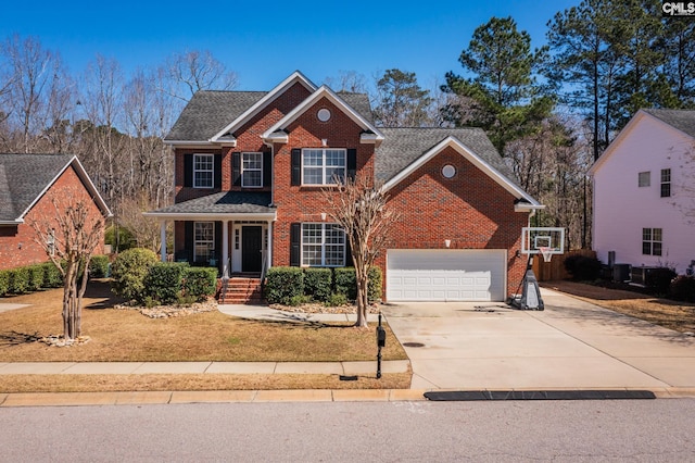 257 Popes Ln, Lexington, SC 29072 - view of front of home featuring brick siding, concrete driveway, a garage, and roof with shingles