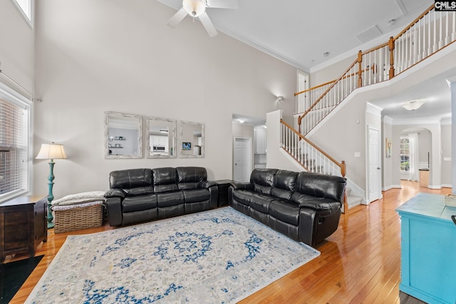 257 Popes Ln, Lexington, SC 29072 - living area featuring high vaulted ceiling, crown molding, a ceiling fan, arched walkways, and light wood finished floors