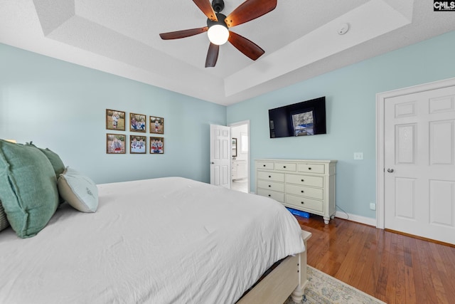 257 Popes Ln, Lexington, SC 29072 - bedroom with a raised ceiling, wood finished floors, baseboards, and a ceiling fan