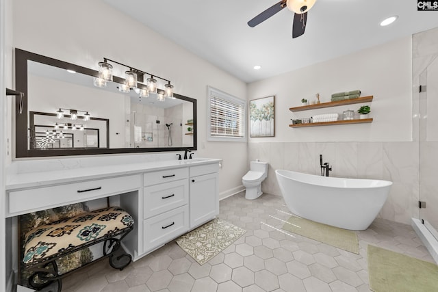 257 Popes Ln, Lexington, SC 29072 - bathroom featuring a shower stall, ceiling fan, vanity, a soaking tub, and recessed lighting