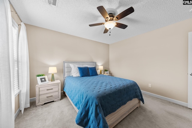 257 Popes Ln, Lexington, SC 29072 - bedroom with light colored carpet, a textured ceiling, ceiling fan, and baseboards
