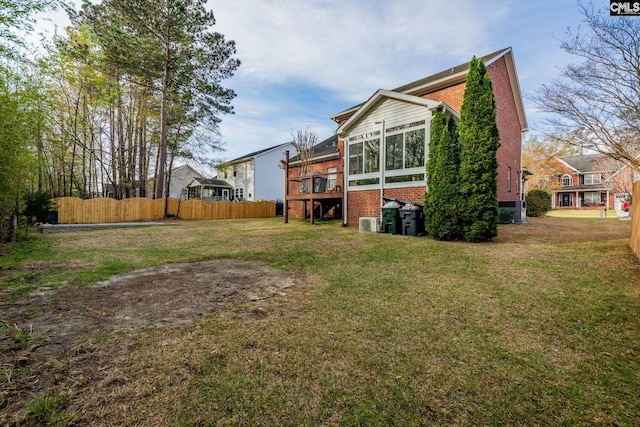 257 Popes Ln, Lexington, SC 29072 - rear view of house with brick siding, a deck, a sunroom, and central air condition unit
