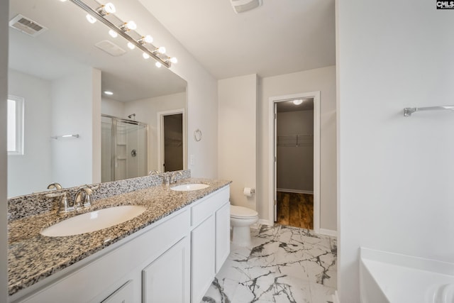 full bathroom with visible vents, a shower stall, marble finish floor, and a sink