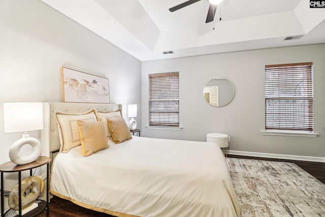 208 Bailey Island Cir, Lexington, SC 29072 - bedroom featuring visible vents, wood finished floors, and a raised ceiling