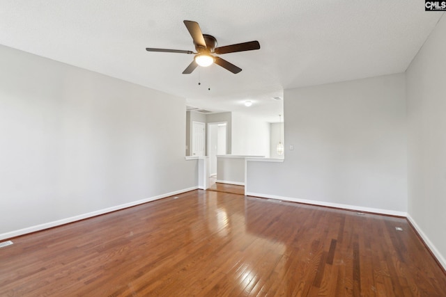 208 Bailey Island Cir, Lexington, SC 29072 - spare room with baseboards, visible vents, wood finished floors, and ceiling fan