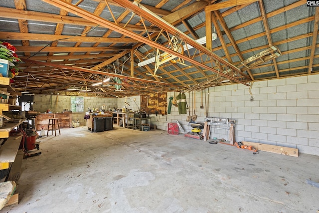 garage featuring concrete block wall