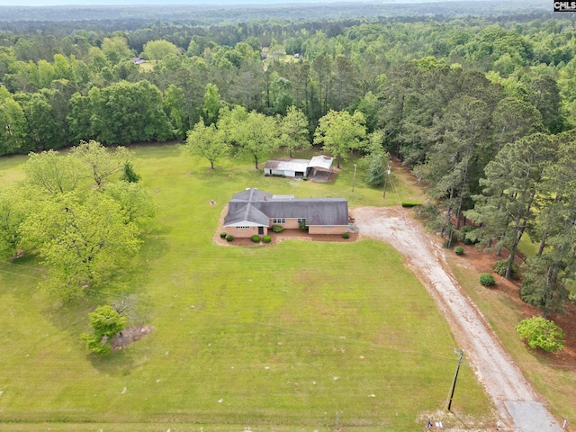 aerial view featuring a forest view