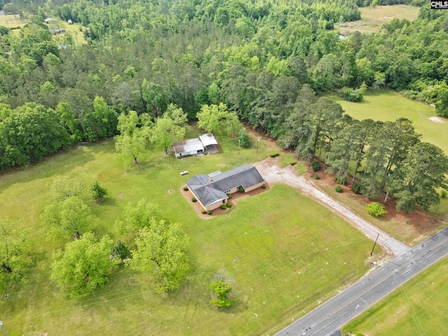 aerial view featuring a forest view