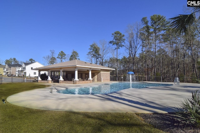 pool featuring a patio and fence