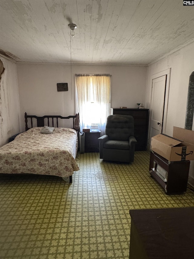 carpeted bedroom featuring wooden ceiling