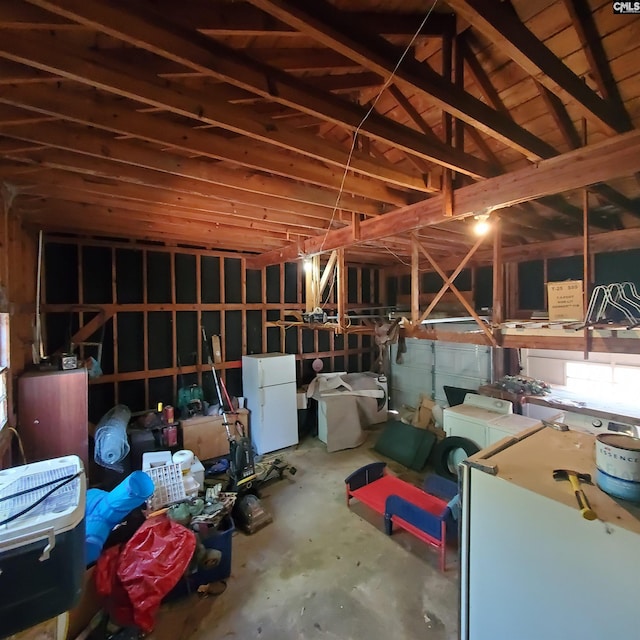 misc room with concrete floors and a garage