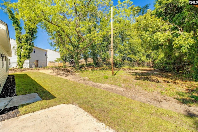 view of yard featuring fence