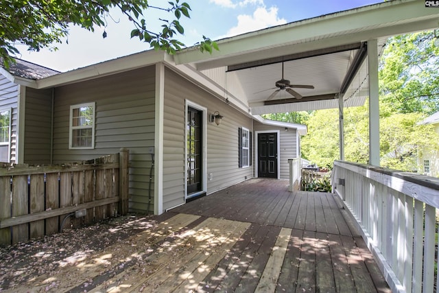 deck featuring fence and a ceiling fan