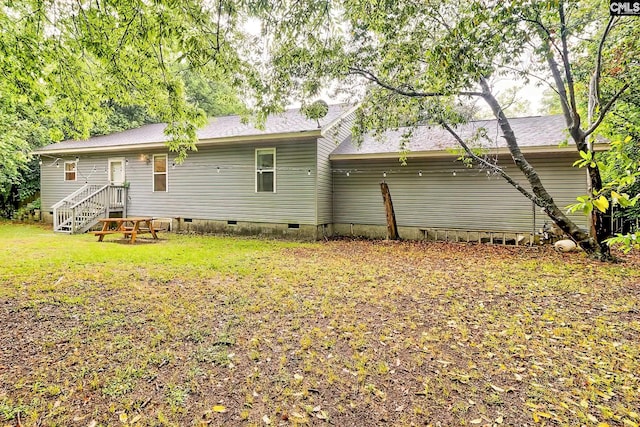 back of property with crawl space