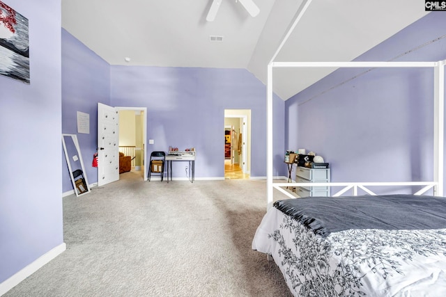 bedroom with baseboards, carpet, and lofted ceiling
