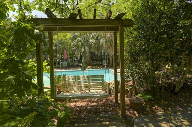 exterior space featuring an outdoor pool