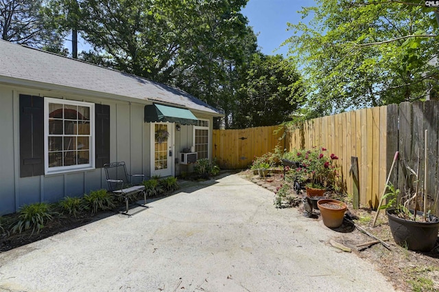 view of patio / terrace with a fenced backyard and cooling unit