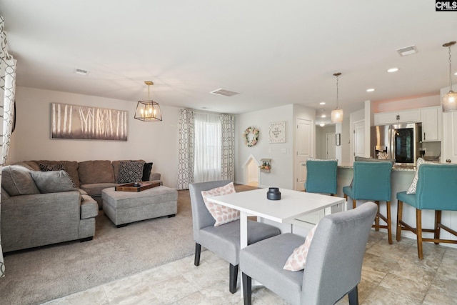 dining room featuring recessed lighting and visible vents