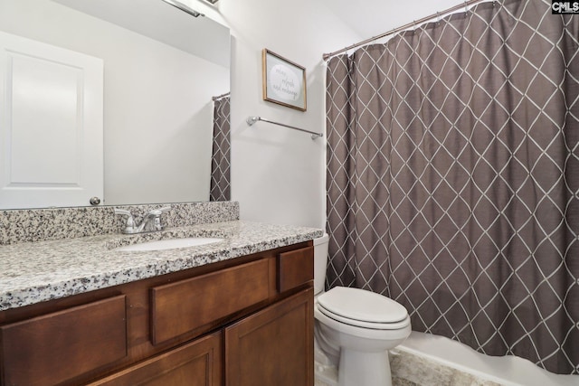 full bathroom featuring vanity and toilet