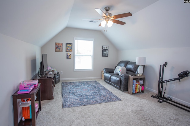 interior space with visible vents, baseboards, ceiling fan, carpet flooring, and vaulted ceiling