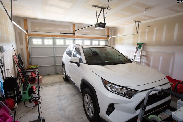 garage featuring a garage door opener