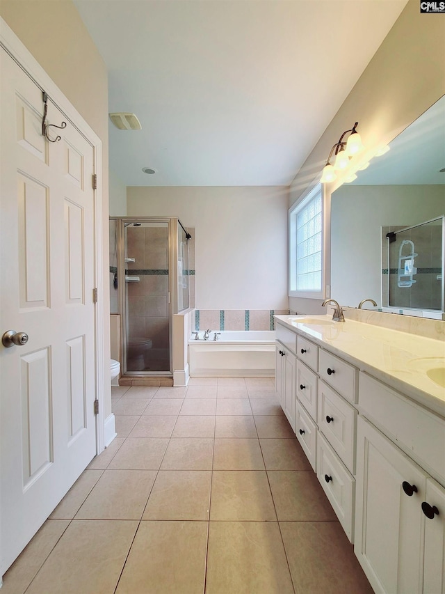 24 Mauser Dr, Lugoff, SC 29078 - bathroom with double vanity, a bath, tile patterned floors, a sink, and a stall shower