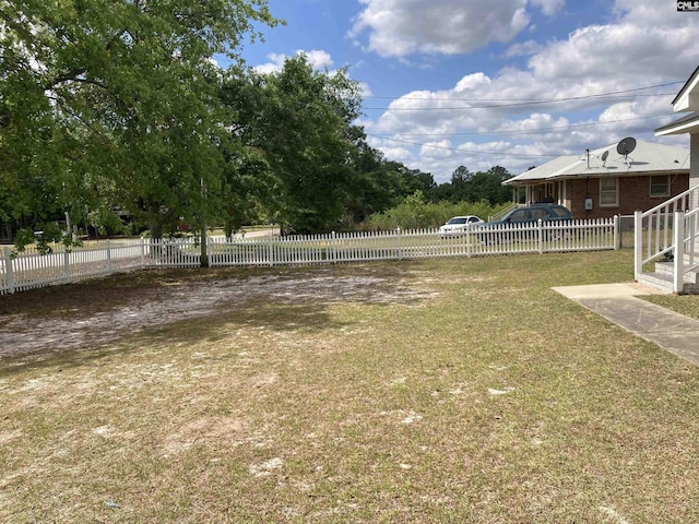 view of yard with fence
