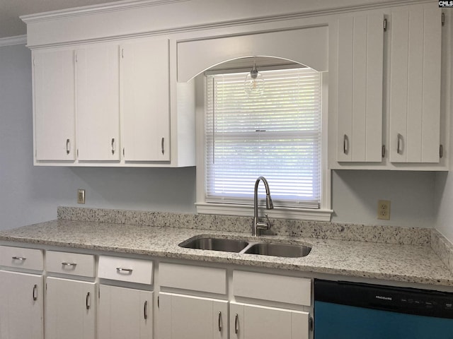 kitchen featuring dishwashing machine, white cabinets, a sink, and a healthy amount of sunlight