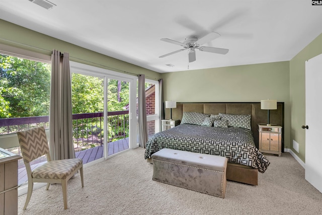 carpeted bedroom featuring access to outside, a ceiling fan, visible vents, and baseboards