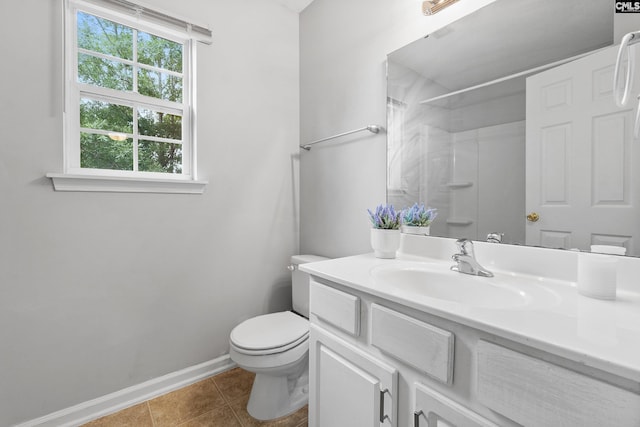 full bath with tile patterned flooring, a shower, vanity, baseboards, and toilet