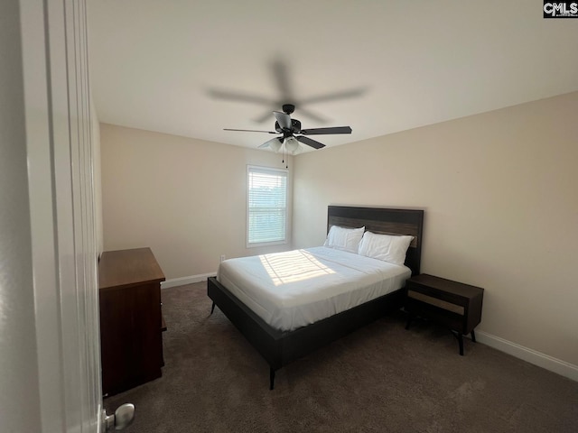 bedroom with baseboards, carpet flooring, and ceiling fan