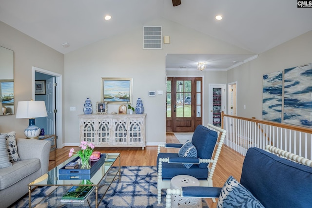 living room with a ceiling fan, visible vents, wood finished floors, high vaulted ceiling, and recessed lighting