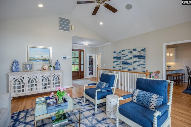 living area featuring ceiling fan, recessed lighting, wood finished floors, and visible vents