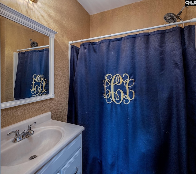 full bath featuring vanity