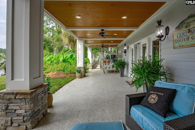 view of patio / terrace featuring ceiling fan
