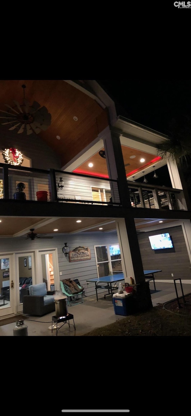 interior space with a ceiling fan
